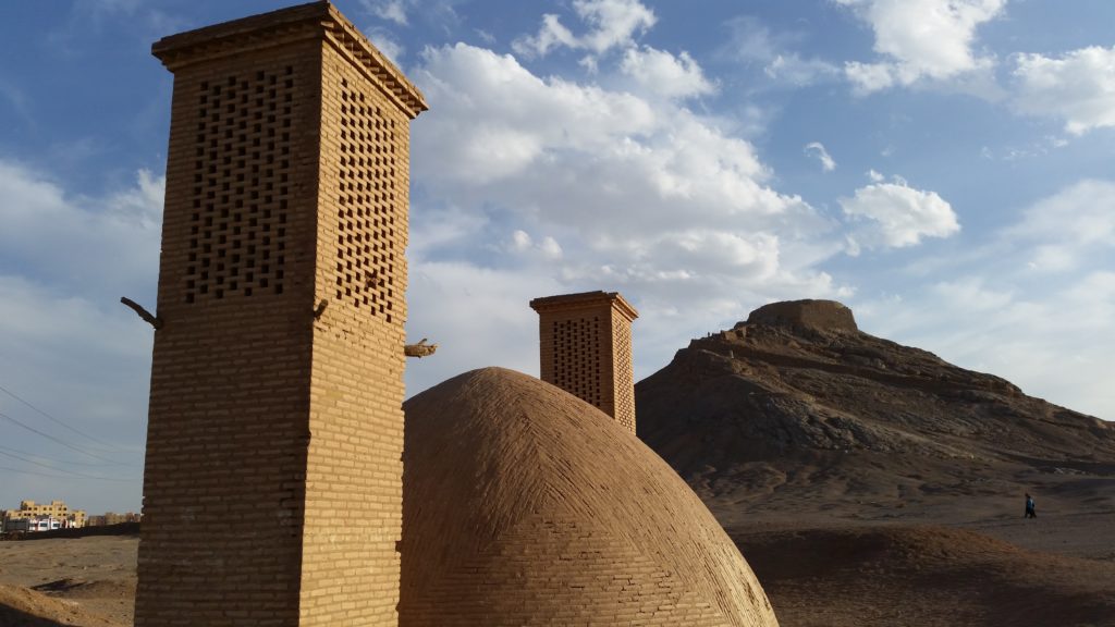 Approaching the Towers of Silence, a badgir (wind tower) in foreground. Yazd. 