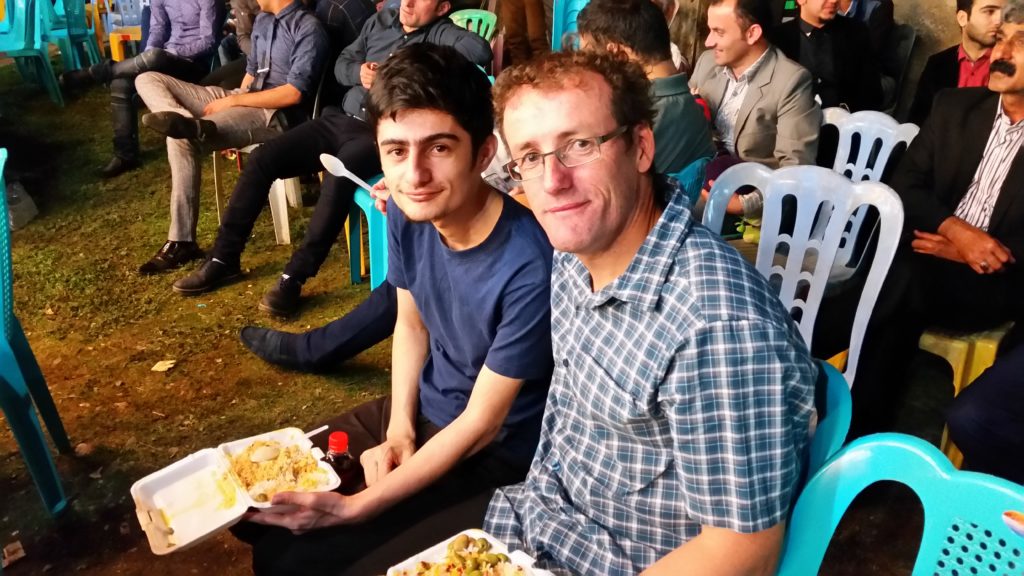 Morteza & Antony with their chicken dinners. Village Wedding, Iran