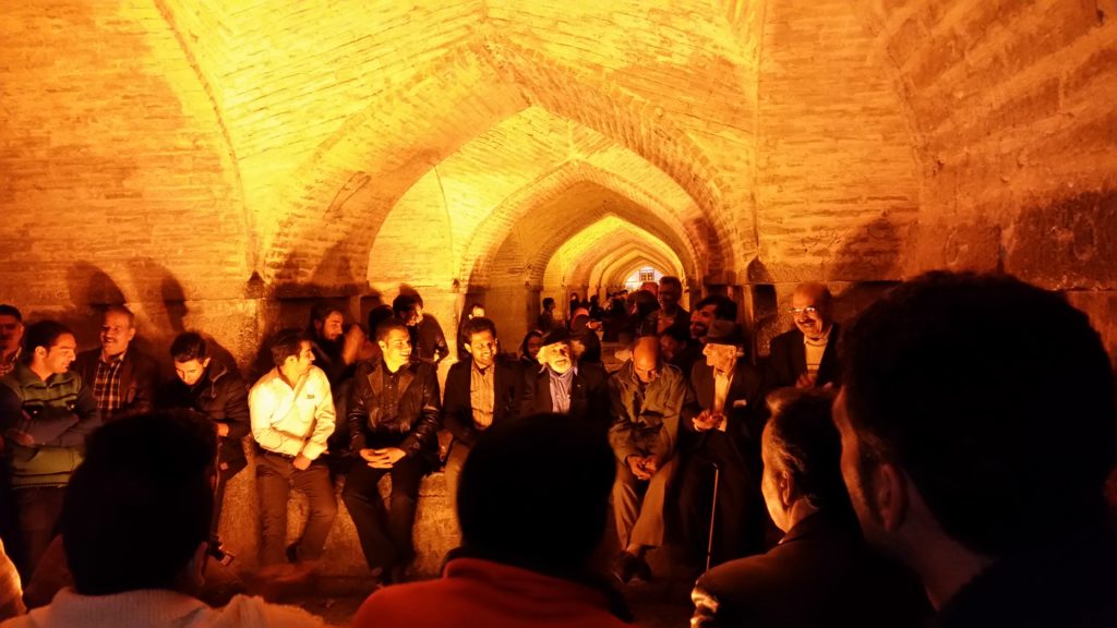 Singing under Khaju Bridge, Esfahan, Iran.