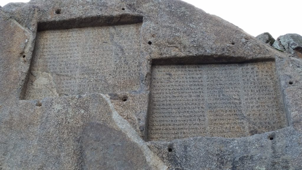 Cuneiform rock carvings, 5thBC, near Hamadan, promoting the greatness of kings Xerxes & Darius.